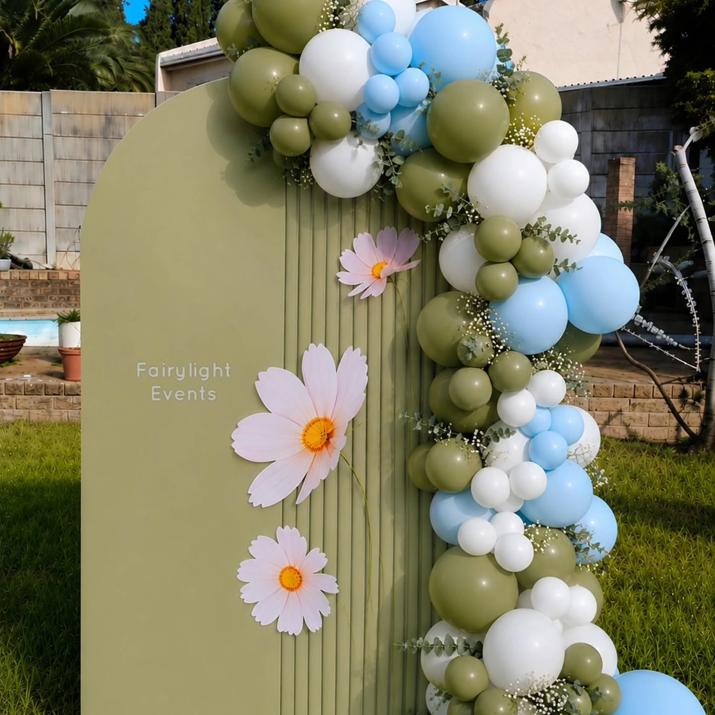 Sage green and gold baby shower balloon garland by Fairylight Events