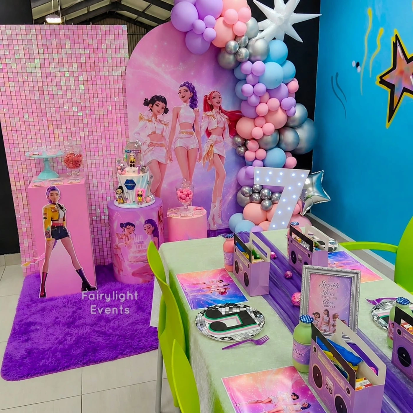 K-pop themed birthday party backdrop with sequin wall