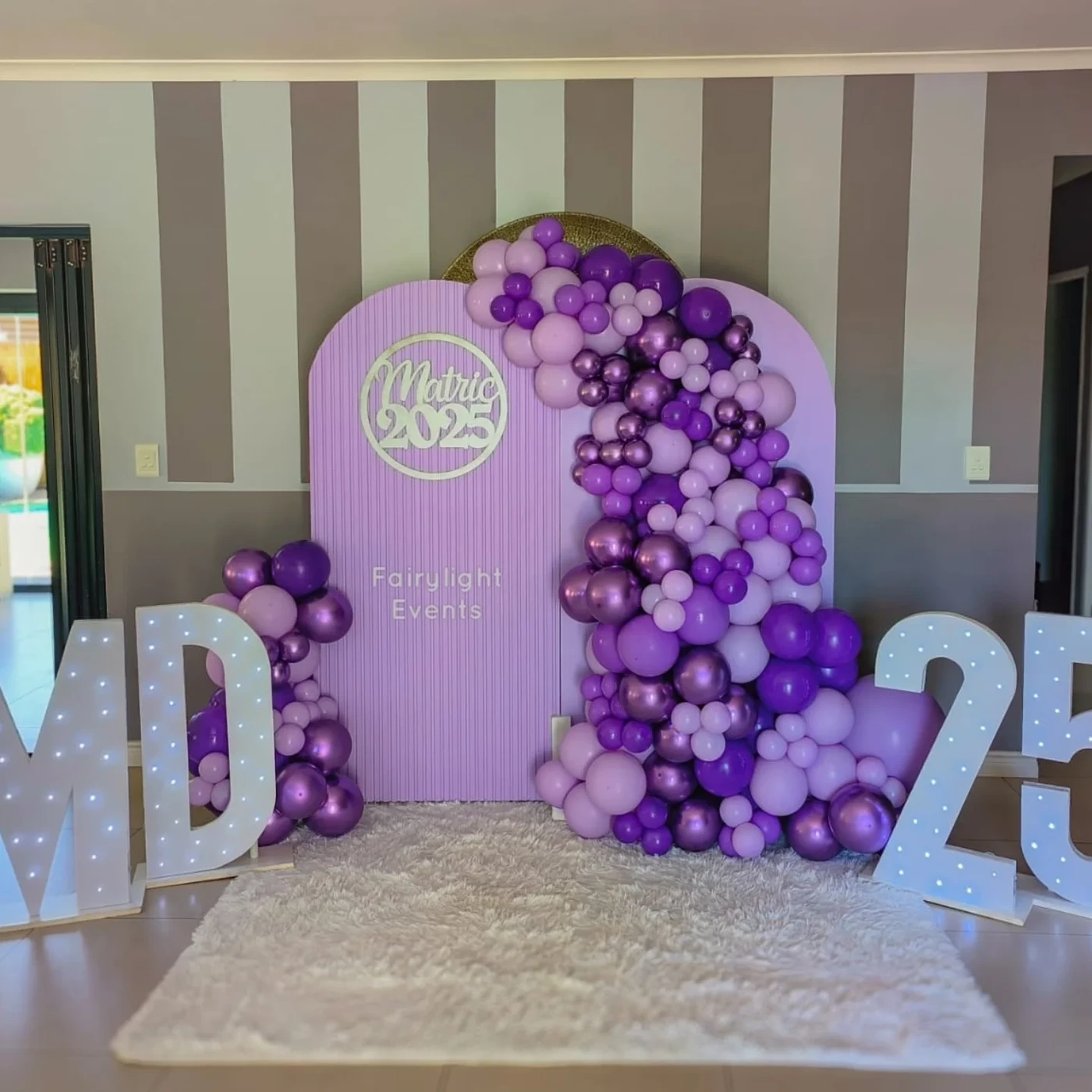 Purple chrome balloon garland matric backdrop